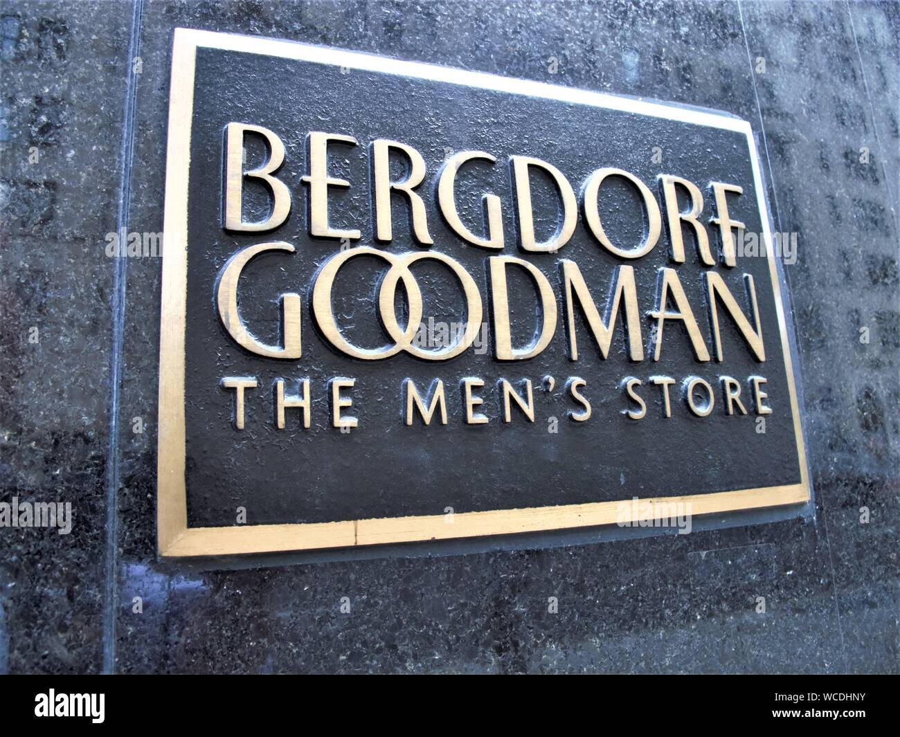 LOGO Bergdorf Goodman gli uomini del negozio sulla parete a Manhattan, NEW YORK Foto Stock