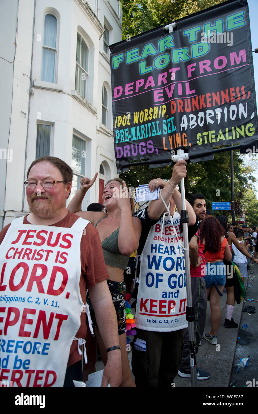 Carnevale di Notting Hill, 25 agosto 2019. Un piccolo gruppo di cristiani fondamentalisti protesta. Foto Stock