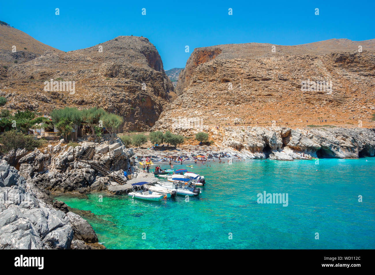 Spiaggia di Marmara alla fine di Aradena gorge e la fascia costiera insieme all'E4 trail a sud-ovest di Creta, Grecia Foto Stock