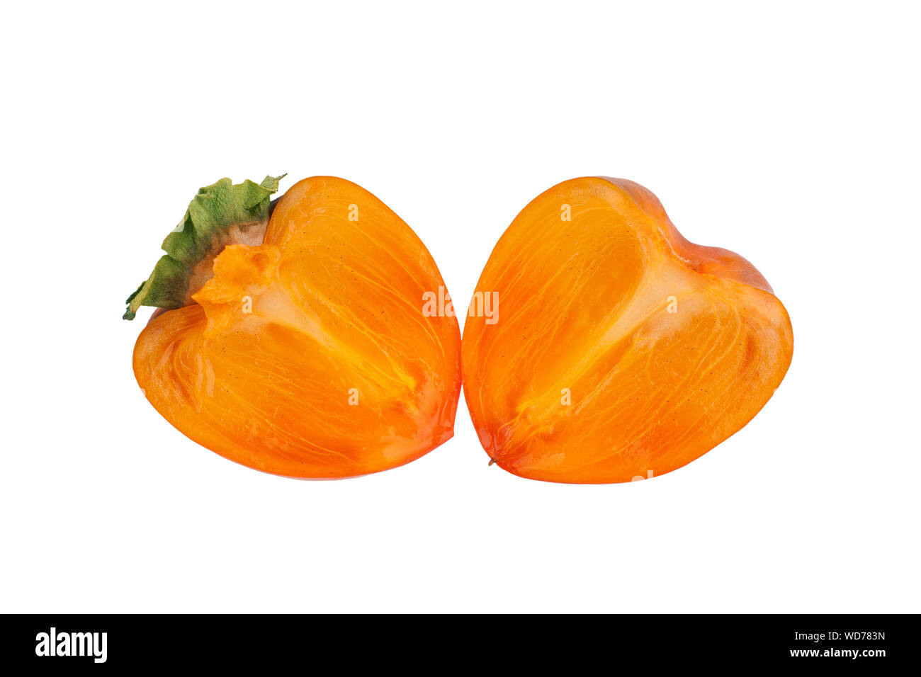 Persimmon orange frutti con foglie verdi affettati in due metà su sfondo bianco isolato da vicino Foto Stock