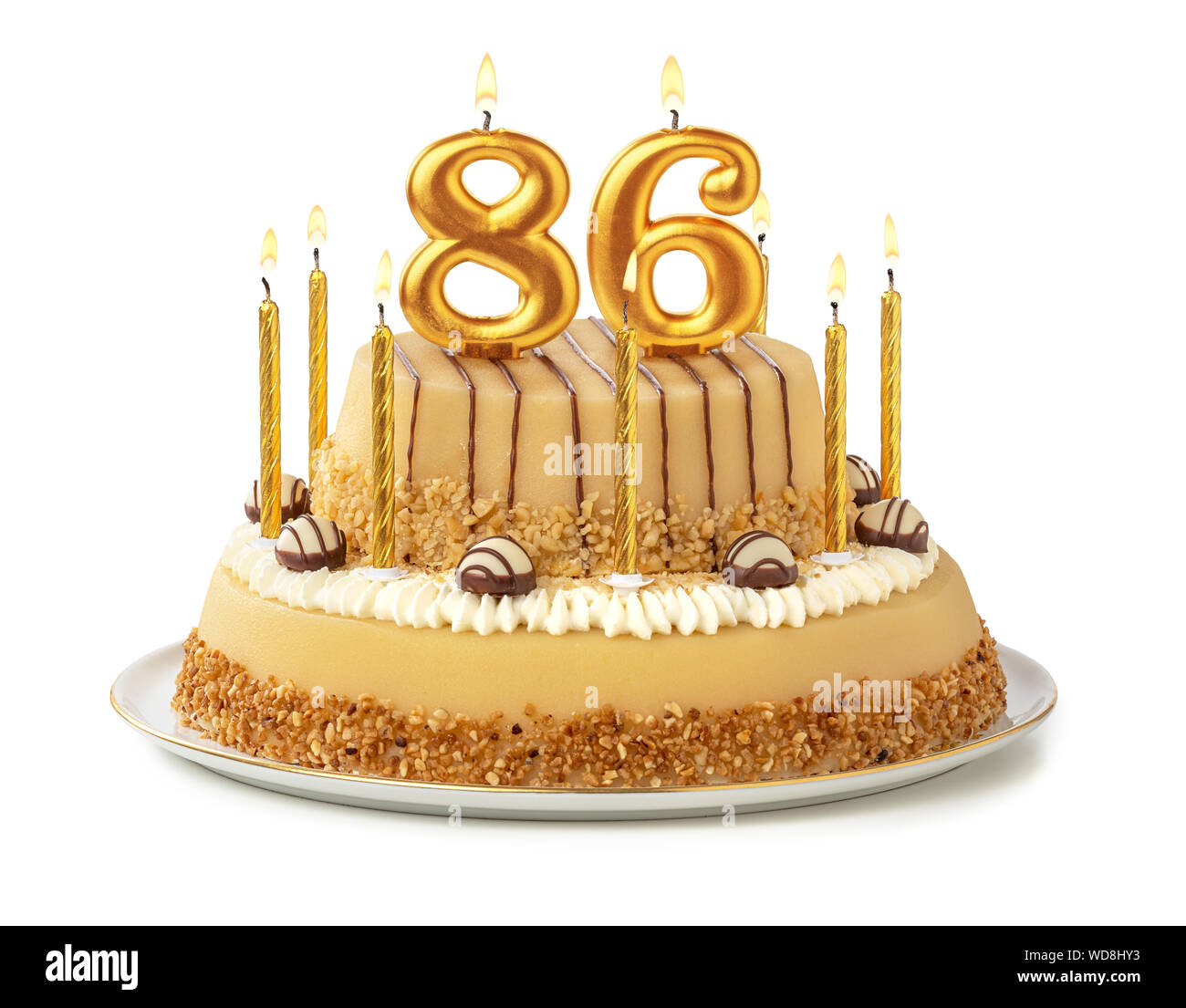 Torta di festa con golden candele - Numero 86 Foto stock - Alamy