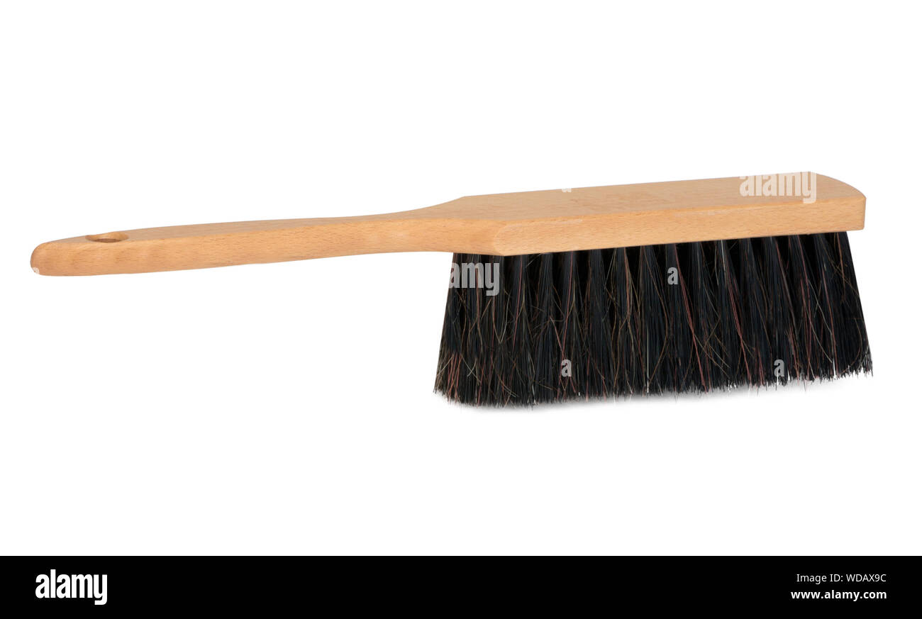 Bench la spazzola con manico in legno isolato su sfondo bianco. Spazzola parapolvere o contatore duster su sfondo bianco Foto Stock