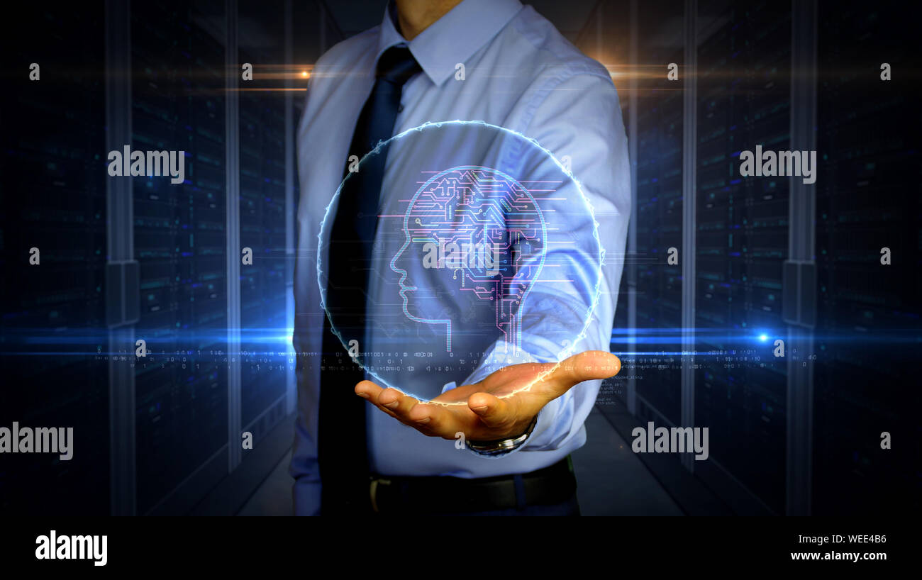 Uomo con dinamica intelligenza artificiale ologramma simbolo sulla mano. Imprenditore e futuristico concetto del cervello cibernetico, profonda e apprendimento cyber mente Foto Stock