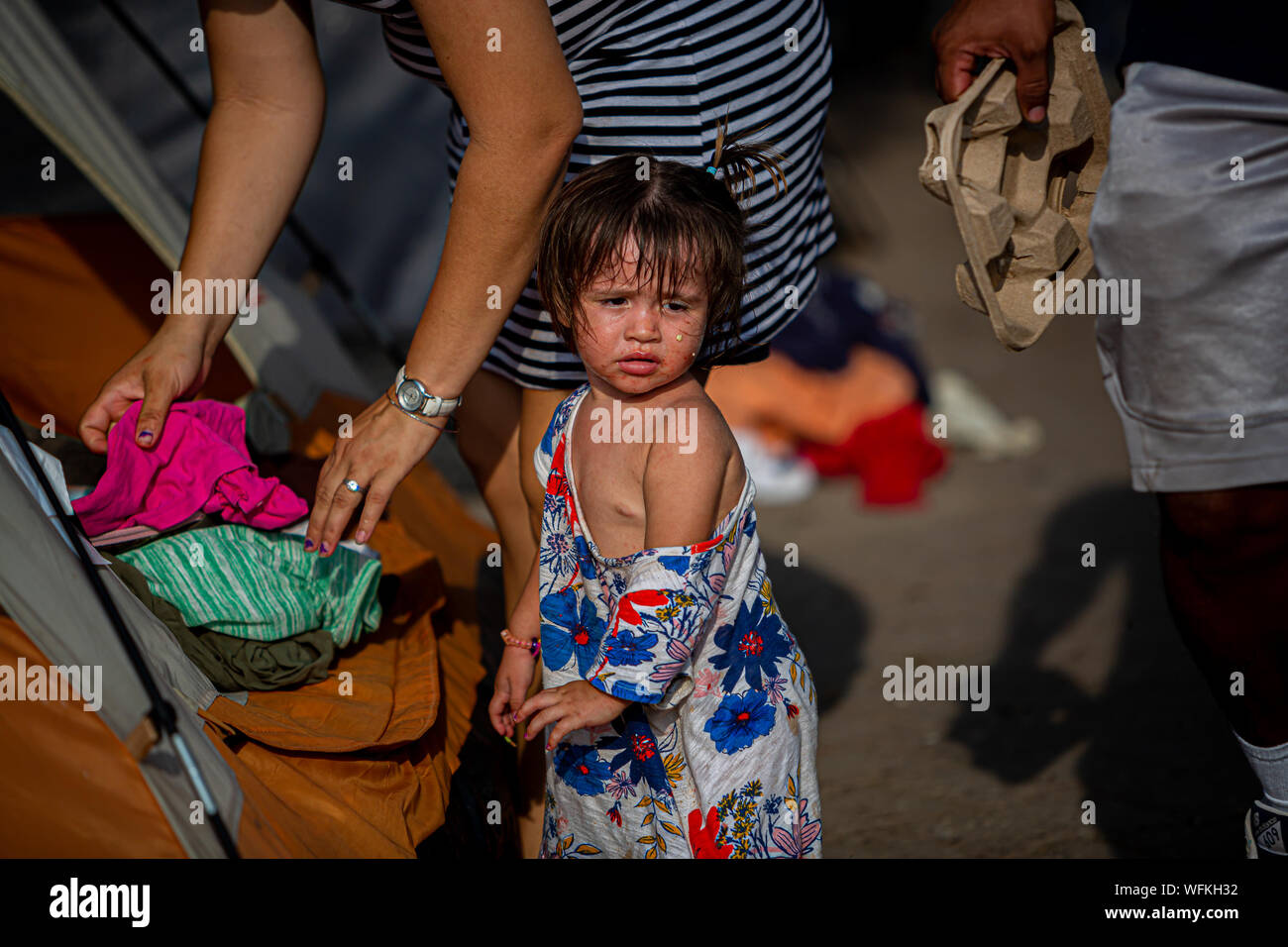 Matamoros, Messico. 24 Ago, 2019. L'immigrazione avvocati che lavorano con la Atlanta di gruppo basato su Avvocati per il buon governo, ha tentato di informare centinaia di richiedenti asilo dei loro diritti giuridici dopo che era stata inviata a Matamoros, come parte della Trump's "rimanere in Messico' programma. (Foto di rana Sajid Hussain/Pacific Stampa) Credito: Pacific Press Agency/Alamy Live News Foto Stock