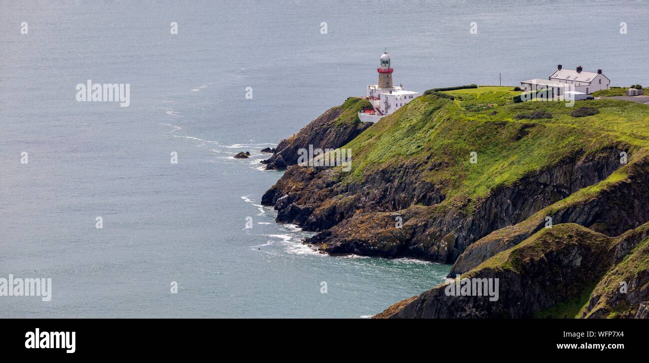 Irlanda, Fingal County, a nord di Dublino, sobborghi di Howth, cliff sentieri escursionistici, Baily Lighthouse Foto Stock