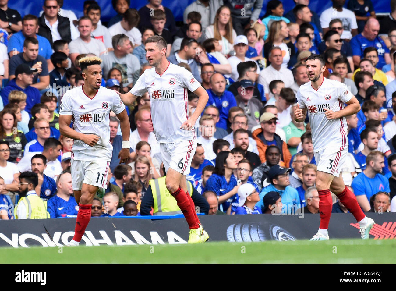 Londra, Regno Unito. 31 Agosto, 2019. Callum Robinson (L) di Sheffield Regno celebra dopo rigature durante la Premier League inglese match tra Chelsea e Sheffield Regno a Stamford Bridge di Londra, Gran Bretagna il 31 agosto, 2019. Credito: Xinhua/Alamy Live News Foto Stock