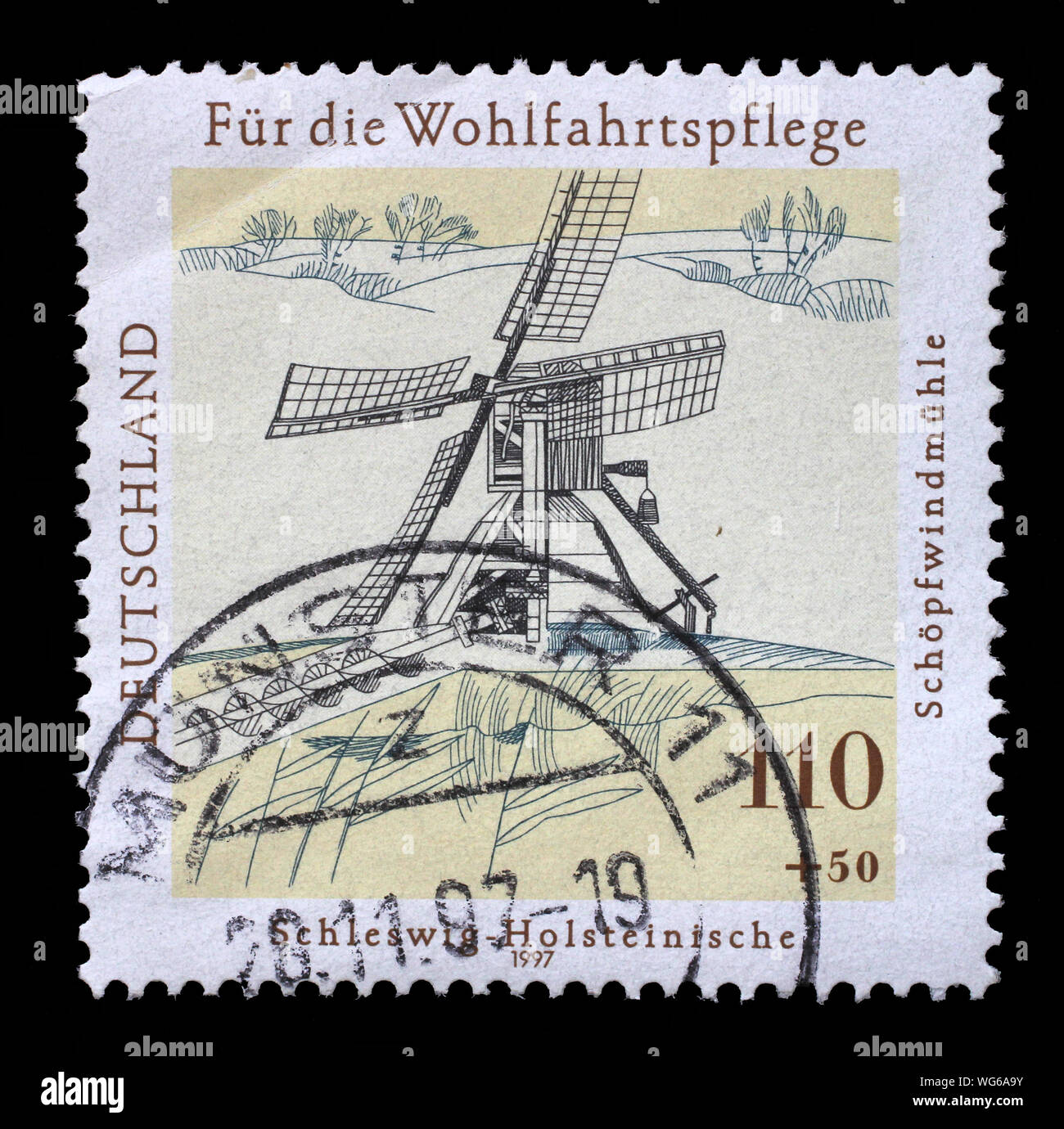 Timbro stampato in Germania mostra il benessere: Acqua e mulini a vento, circa 1997. Foto Stock