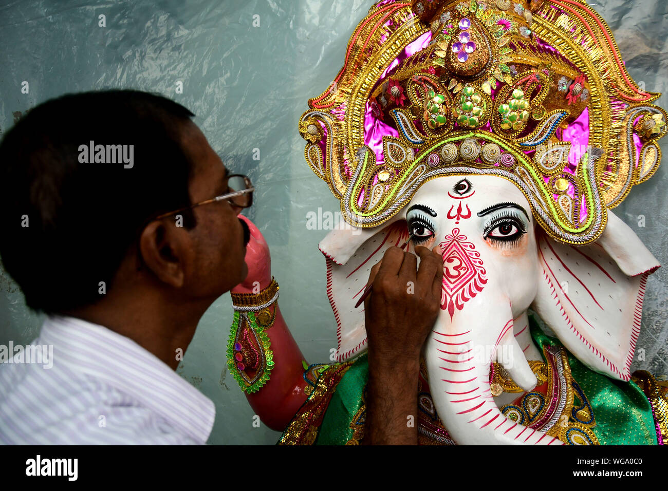 Idol del Signore Ganesha . Gli artigiani di kumortuli , kolkata rende migliaia di signore ganesha idoli di argilla ogni anno. Foto Stock