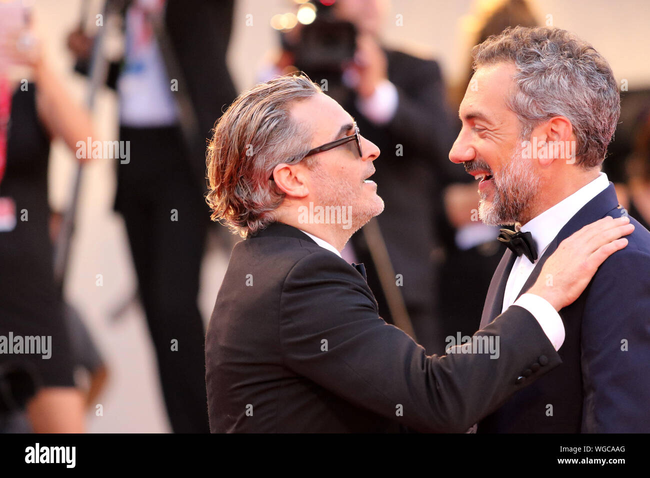 L'Italia, Lido di Venezia, 31 agosto 2019 : Joaquin Phoenix e il regista Todd Phillips a piedi il tappeto rosso davanti a "Jolly" screening durante la 76t Foto Stock