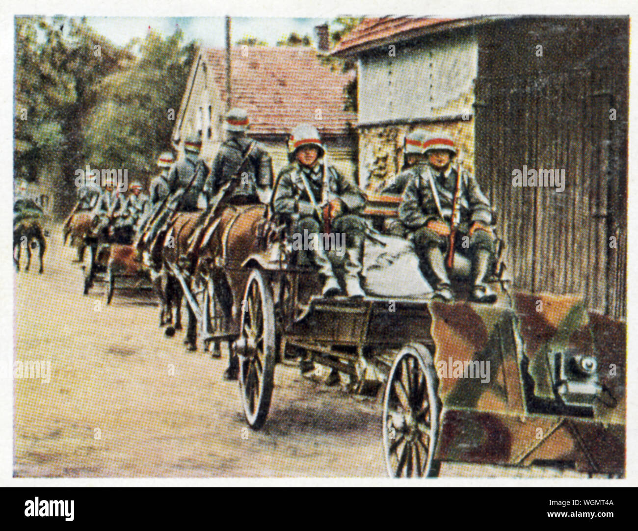 Società della Wehrmacht di luce pistole, 1936 carta di sigaretta di soldati tedeschi di formazione con un cavallo e un distacco di 7.5 cm supporto infabtry cannoni e mortai Foto Stock