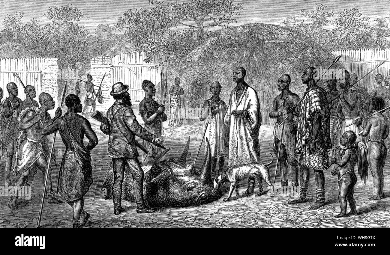 John Hanning Speke (1827-1864) presentando il bottino di Romanika testa di rinoceronte bianco, girato in Karague. John Hanning Speke era un ufficiale in l'esercito indiano britannico che ha fatto tre viaggi di esplorazione in Africa. . . Foto Stock