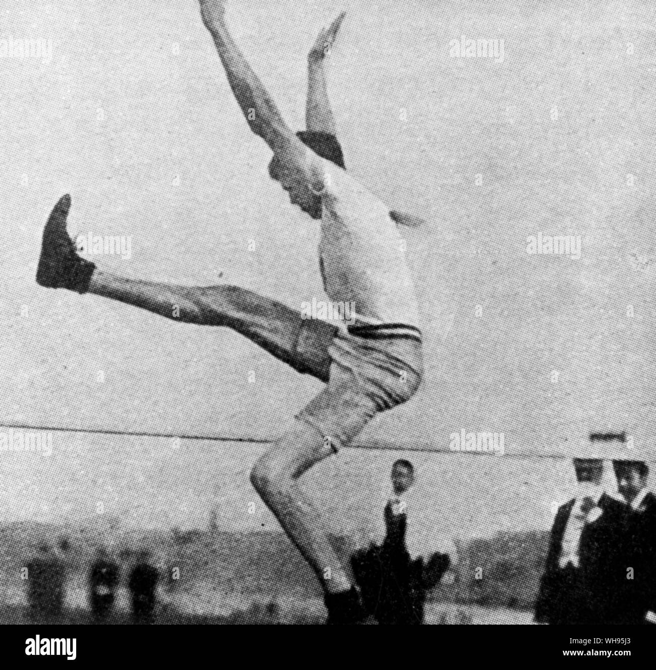 St Louis, USA.Giochi Olimpici 1904: Ray Ewry vince standing salto in alto. Foto Stock