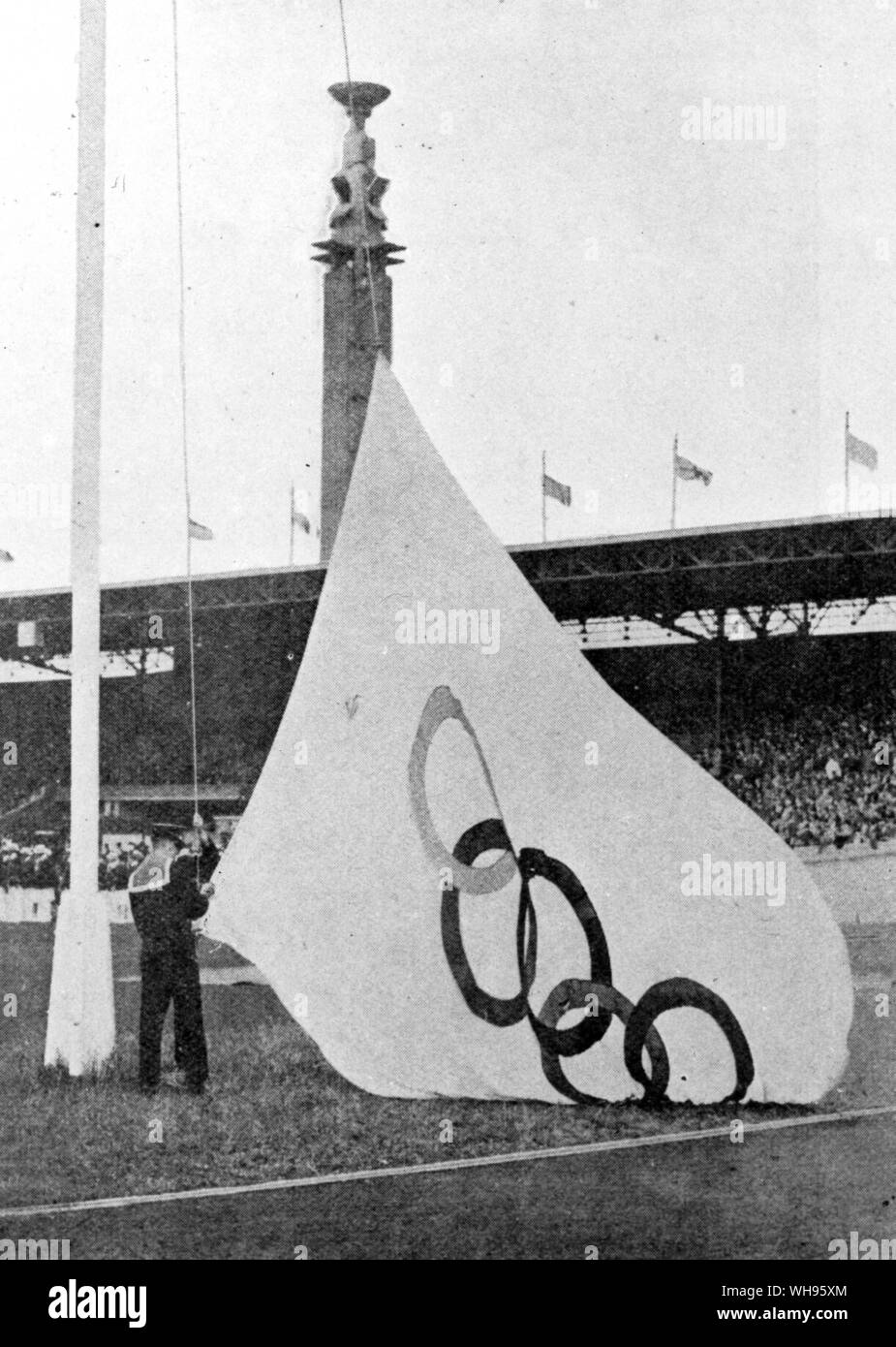 Bandiera olimpica alla cerimonia di apertura dei Giochi Olimpici di Amsterdam 1928 Foto Stock