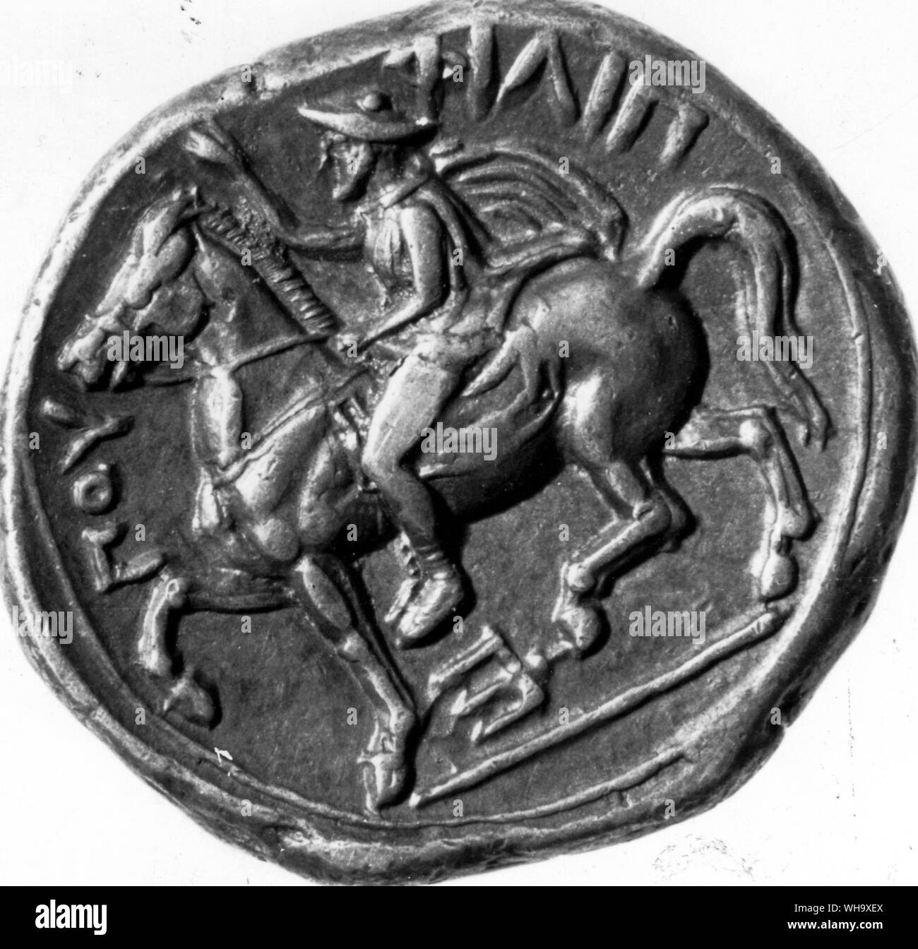Filippo II di Macedon su un cavallo coin che commemora la sua vittoria olimpica Foto Stock