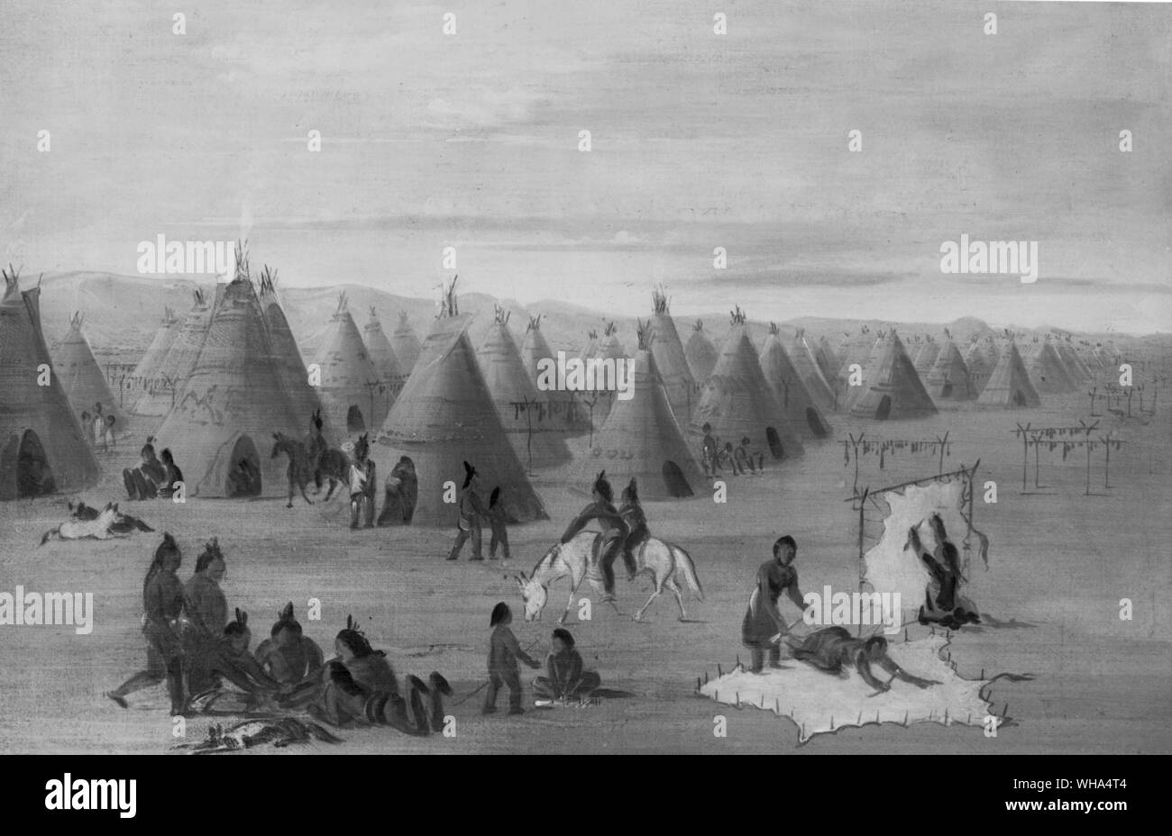 Comanchee villaggio in Texas che mostra uno sperone di roccia montagne in distanza, lodges fatta di pelli di bufalo; donne vestire le vesti e le carni di essiccazione. 1834 Foto Stock