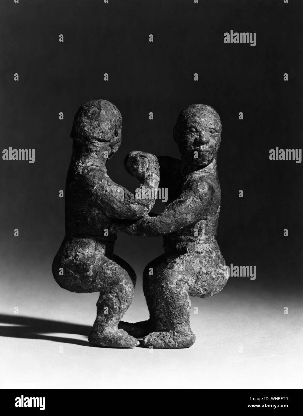 Bronzo cinese - due lottatori - V-IV secolo A.C. Foto Stock