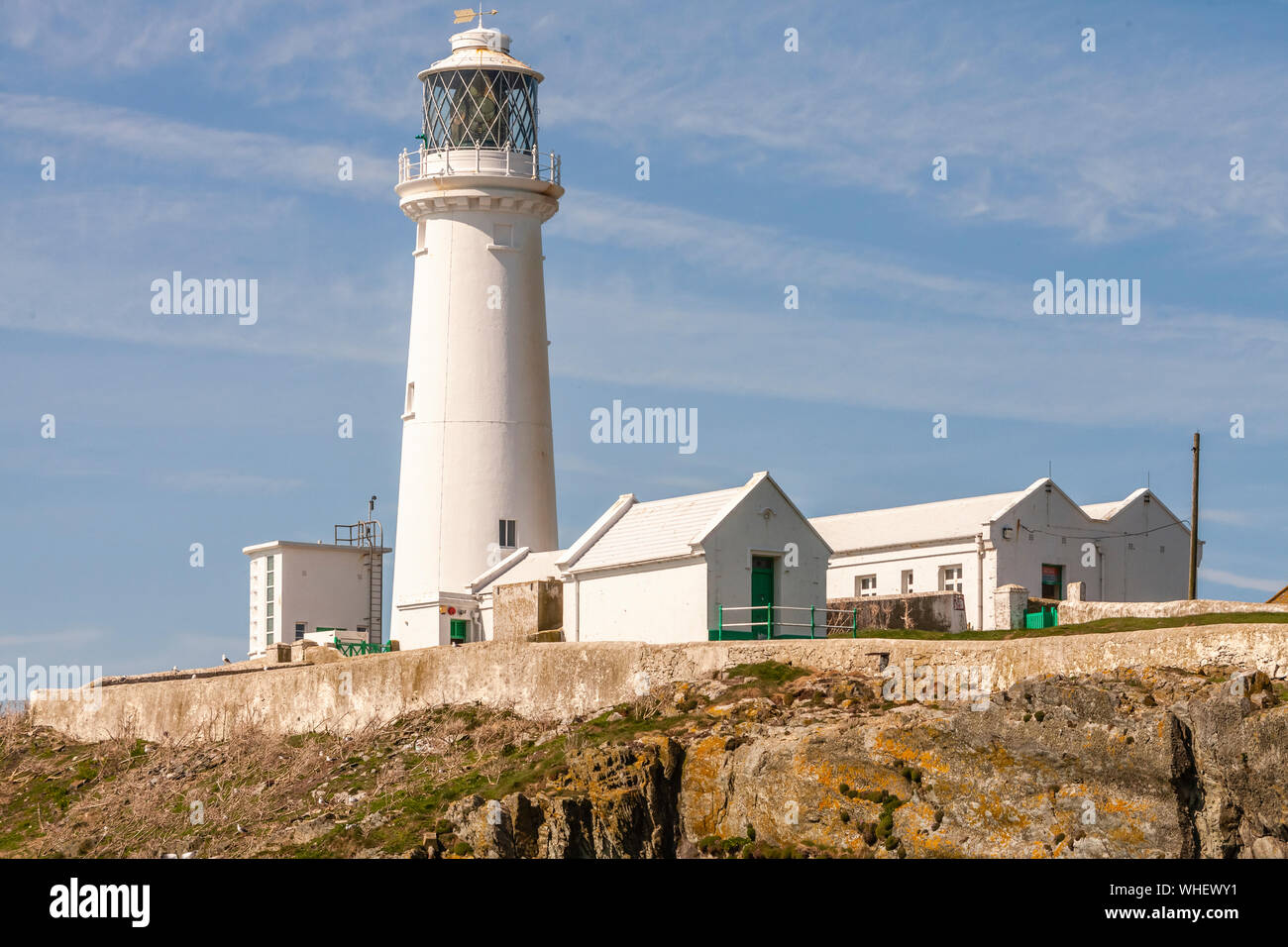 La pila del Sud Faro è costruita sulla cima di una piccola isola a nord-ovest della costa di Isola Santa, Anglesey, Galles. Fu costruita nel 1809 per Foto Stock