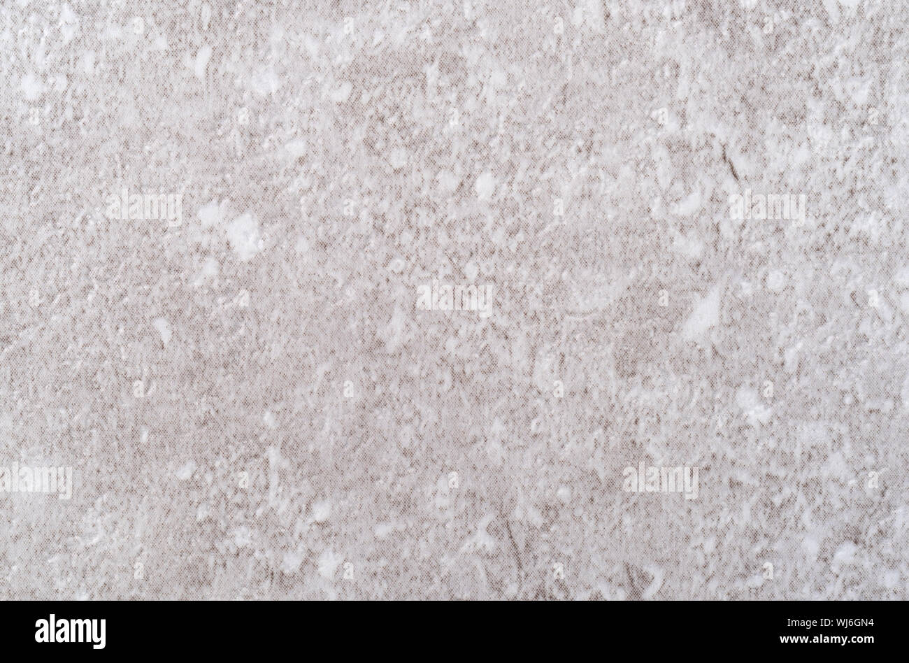 Molto vicino vista di un finto marmo pavimento vinilico piastrella. Foto Stock