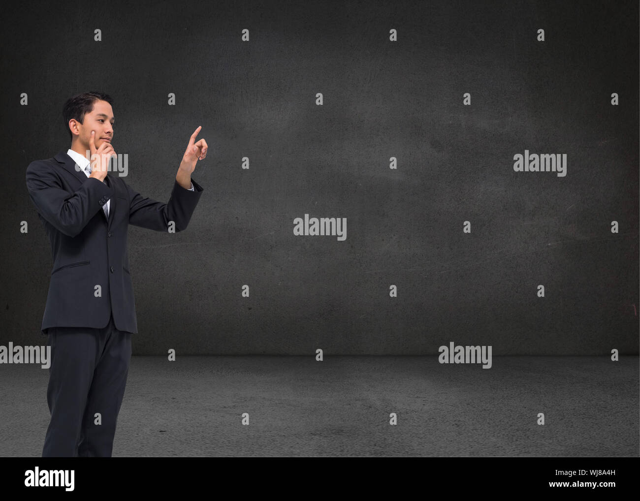 Immagine composita di pensosa asian businessman rivolta Foto Stock