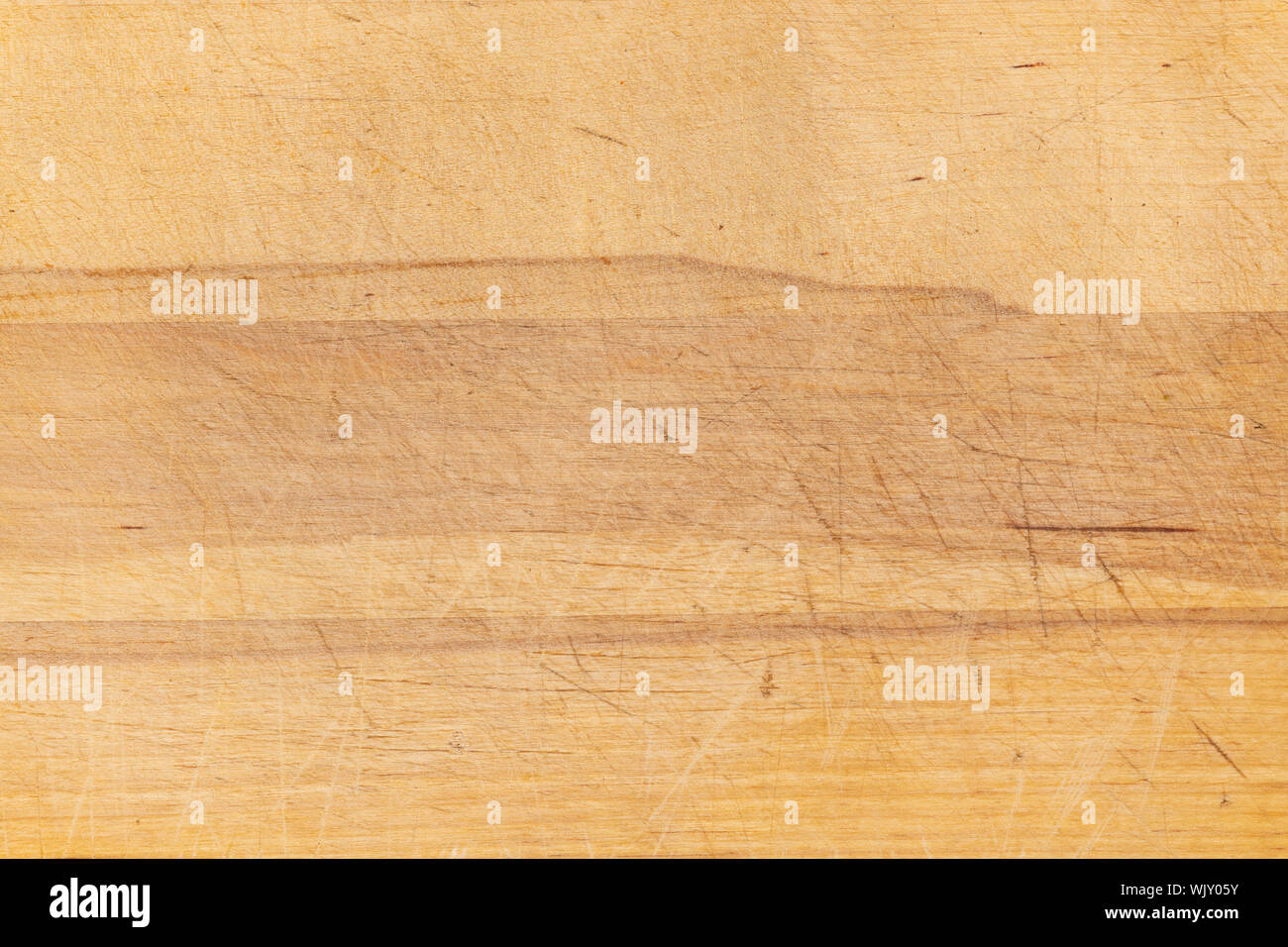 Vecchio graffiato tagliere di legno texture dello sfondo. Foto Stock