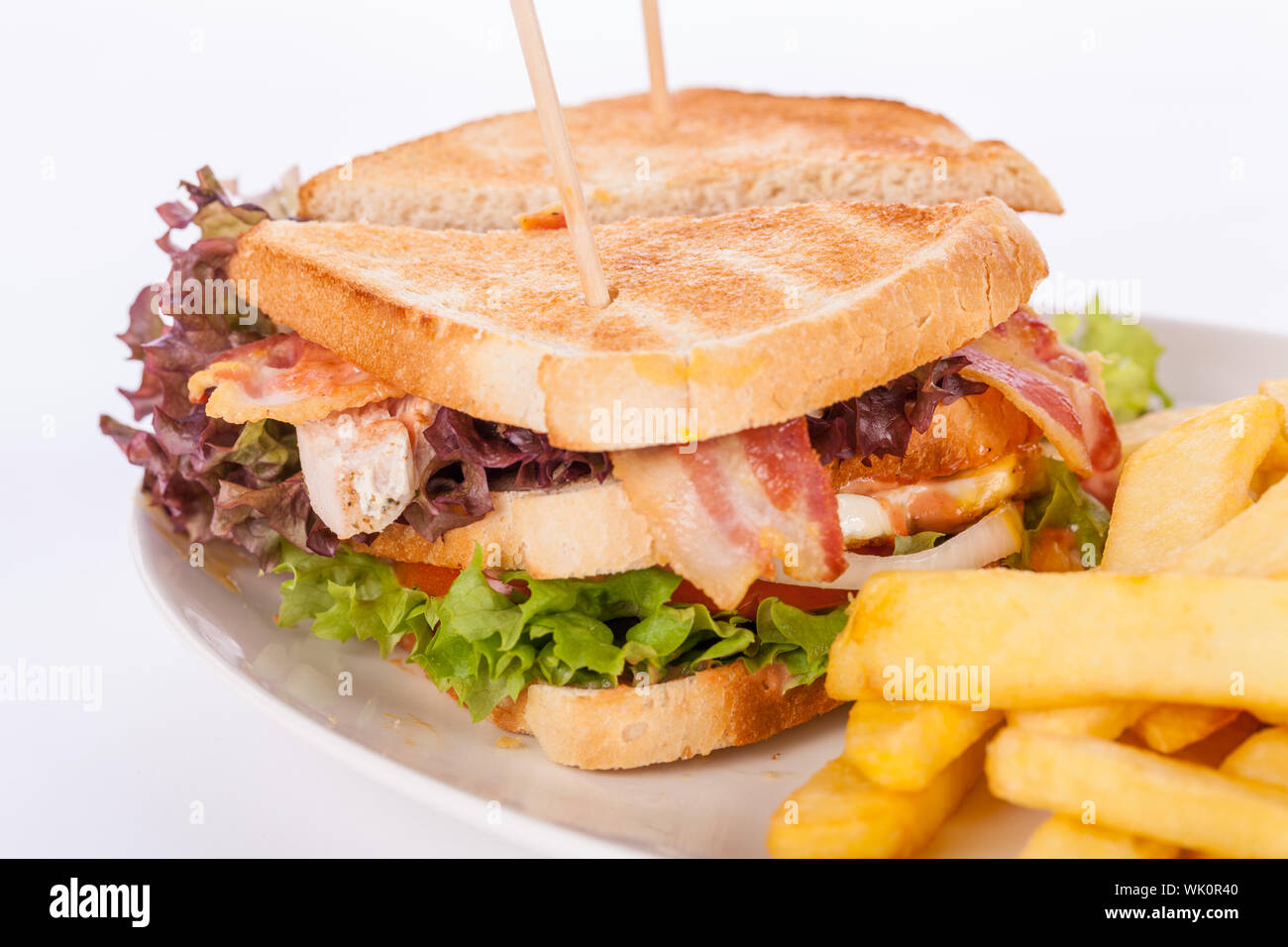 Club sandwich con patate fritte Foto Stock