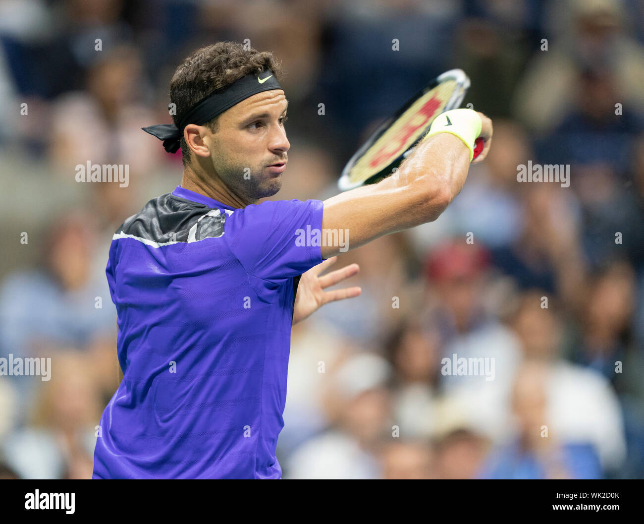 New York, NY - 3 Settembre 2019: Grigor Dimitrov (Bulgaria) in azione durante il trimestre finale del US Open Championships contro Roger Federer (Svizzera) a Billie Jean King National Tennis Center Foto Stock