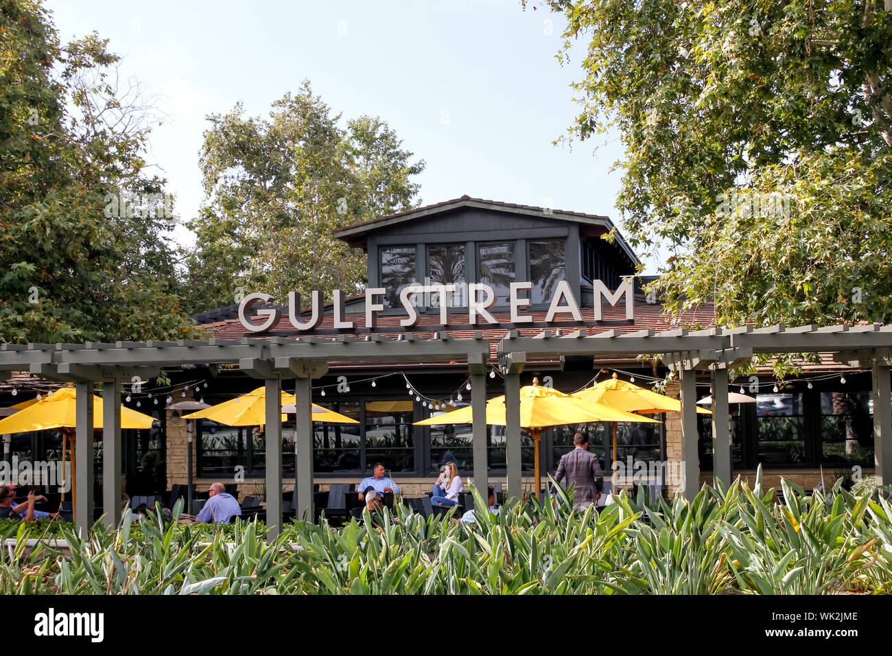 Un negozio di fronte segno per il ristorante di lusso conosciuta come Gulfstream Foto Stock
