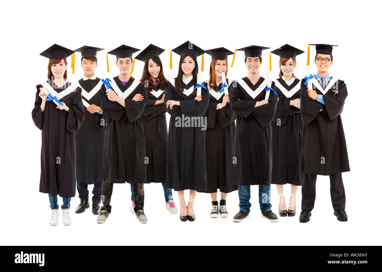 Tutti gli studenti di laurea in piedi una fila Foto Stock