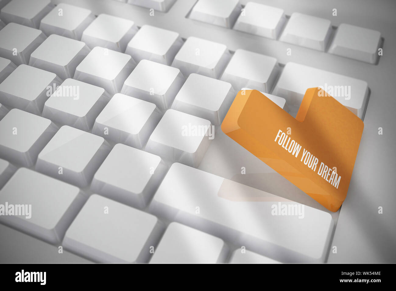 La parola seguire il tuo sogno su bianco la tastiera con il tasto arancione Foto Stock