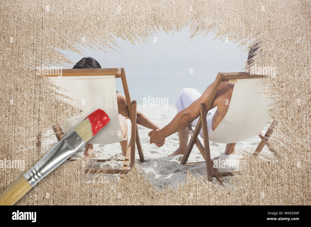 Immagine composita del giovane sulla spiaggia in sedie a sdraio con pennello immerso in rosso contro la superficie spiovente Foto Stock