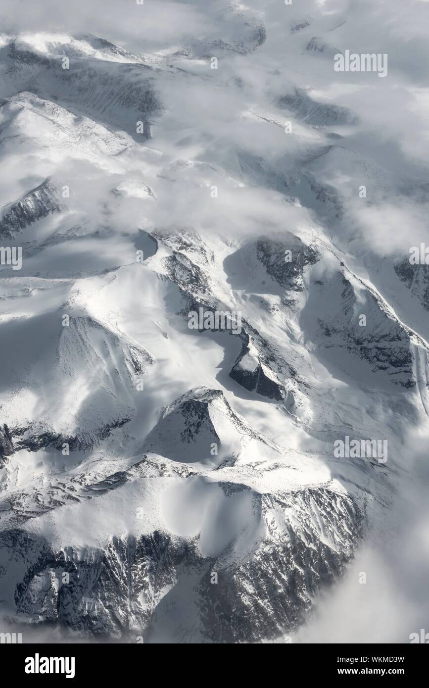 Vista dal piano di coperta di neve paesaggio montuoso, Vista panoramica, Groenlandia Foto Stock