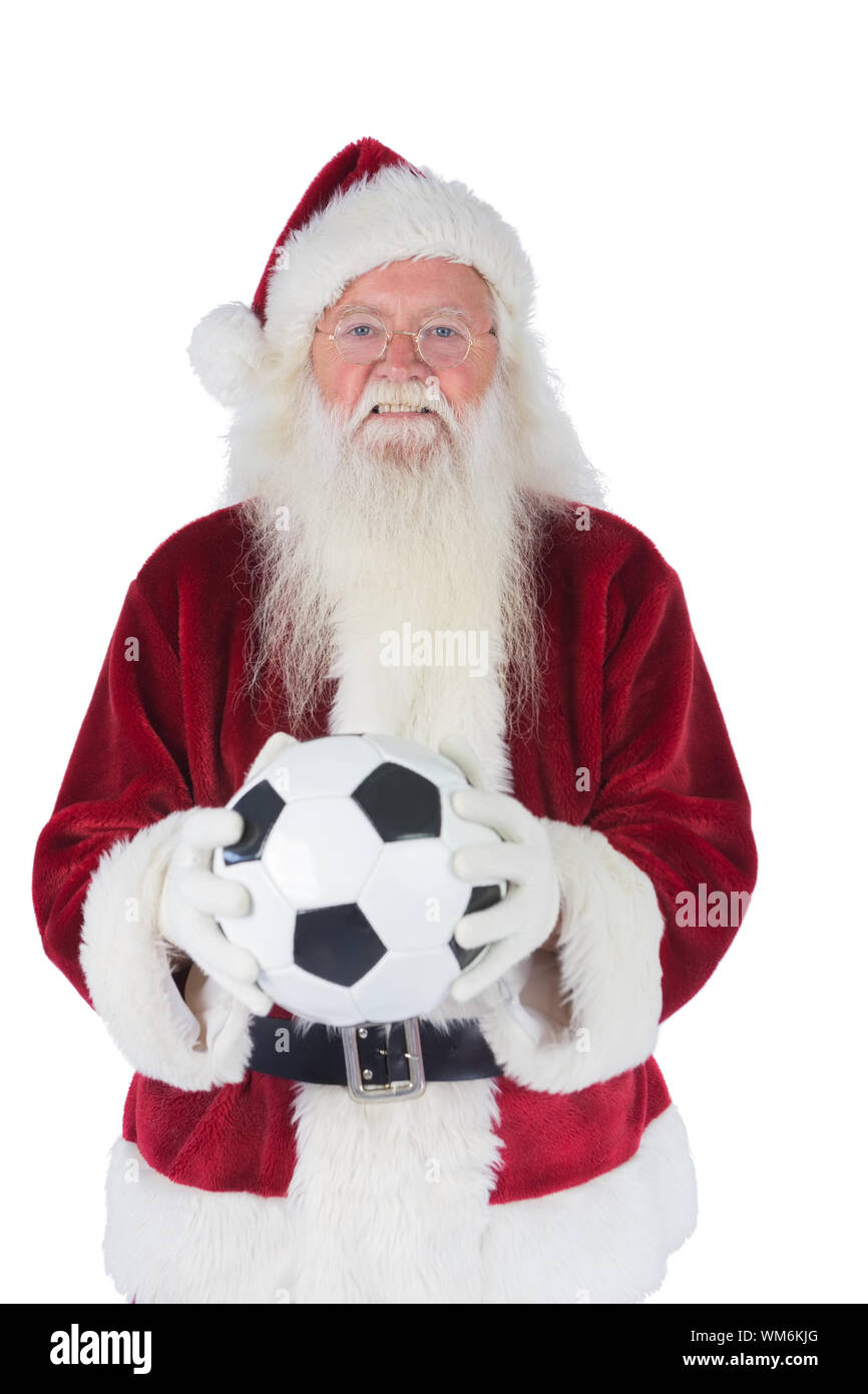 Santa detiene un classico calcio su sfondo bianco Foto Stock