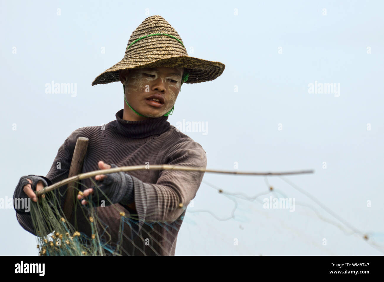 Ritratto di pescatore al Lago Inle, Myanmar Foto Stock