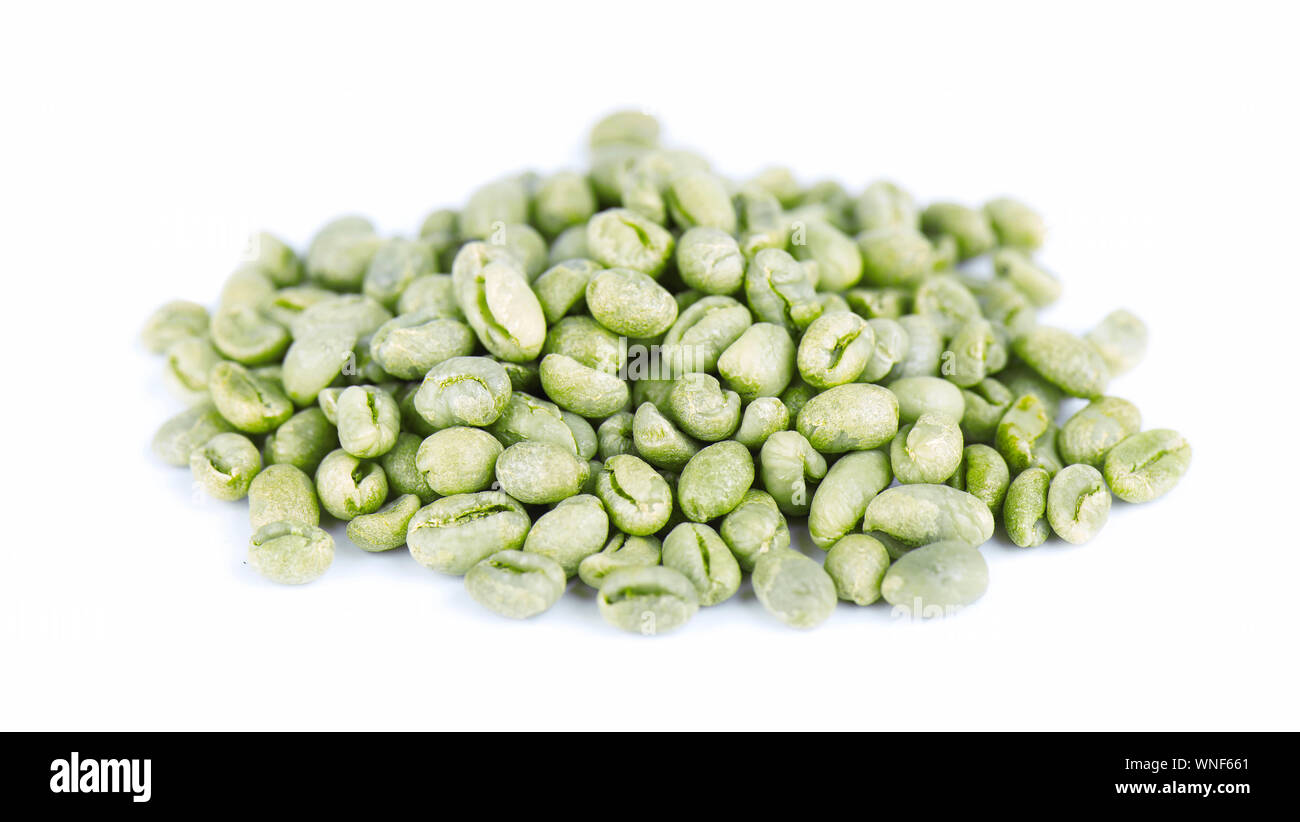 Caffè verde dello sfondo. Verde medio peaberry chicchi di caffè Foto Stock