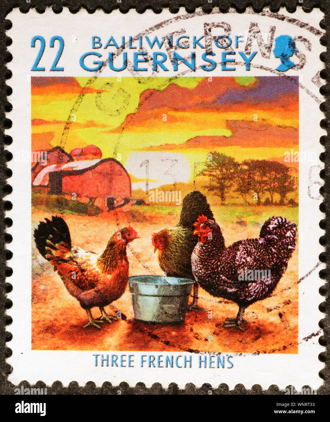 Natale tre galline francese sul timbro di Guernsey Foto Stock