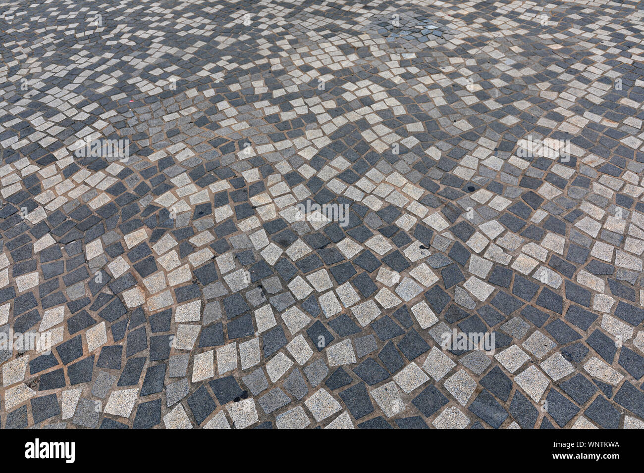 Ciottoli mosaico pavimentazione decorativa in Hong Kong Foto Stock