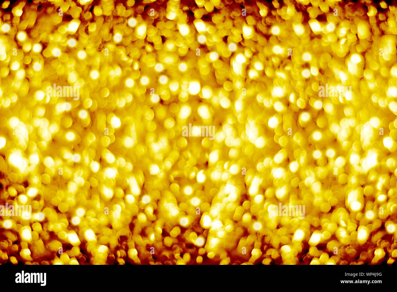 Golden sfocato shining bokeh sfondo giallo sfocati brilla sullo sfondo di colore oro round bolle telaio blur, luci luminose festosa confine design Foto Stock