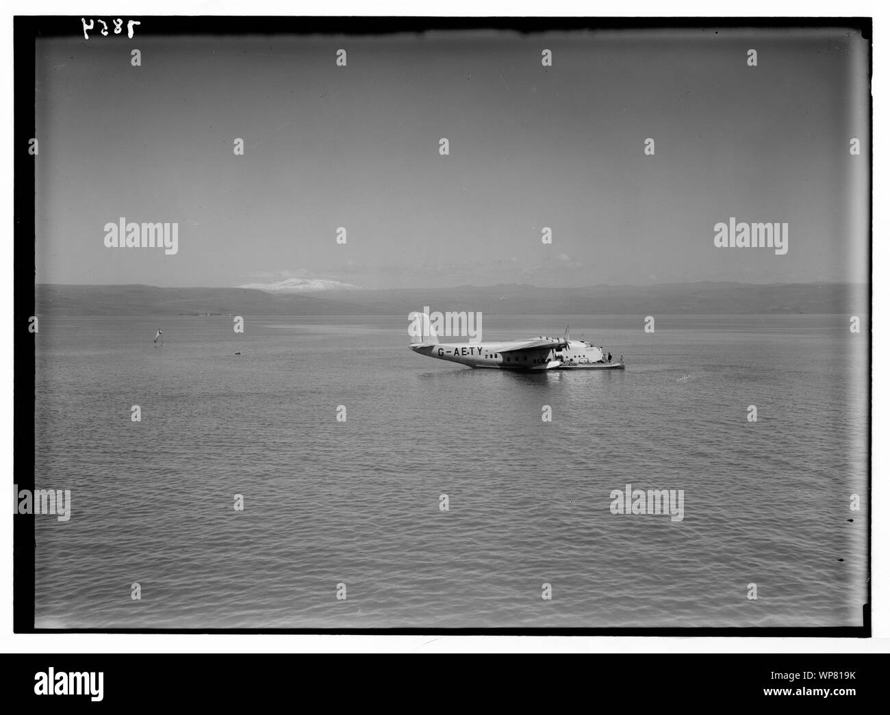 Lido, flying boat Clio. Flying Boat Clio sul lago con snow-capped Hermon Foto Stock
