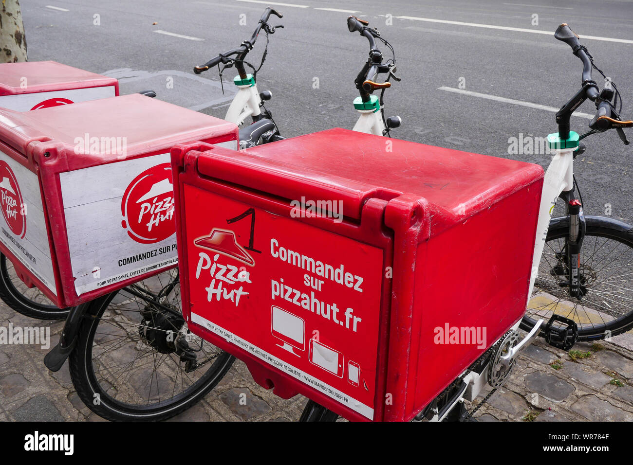 Pizza Hut consegna biciclette, Vincennes, Val-de-Marne, Île-de-France, Francia Foto Stock