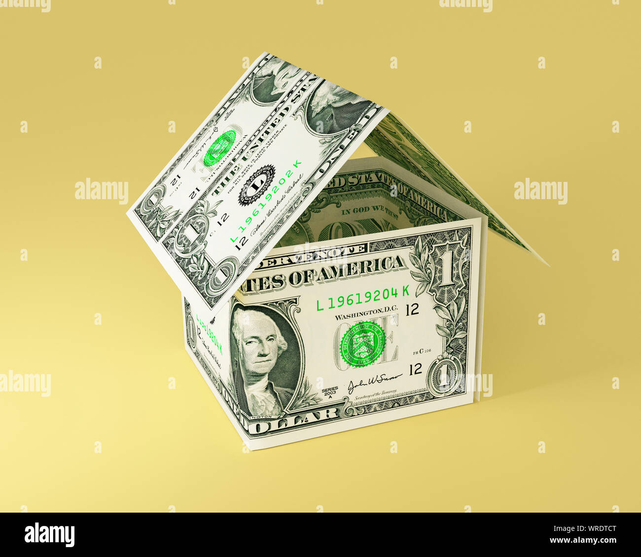 Casa semplice forma resa dal denaro, quattro di noi uno le fatture del dollaro Foto Stock