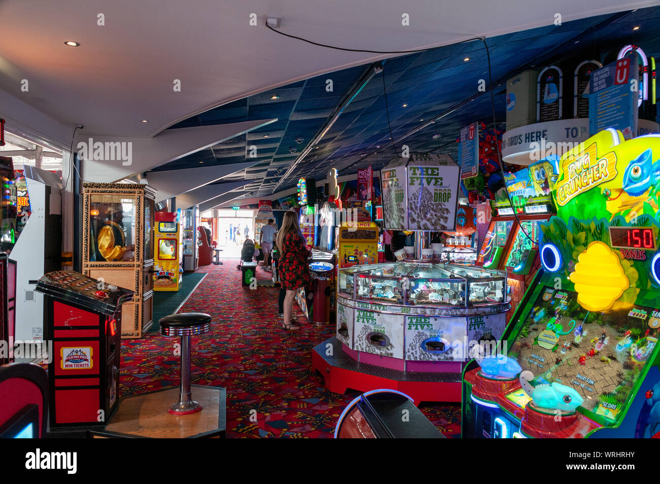 Giochi Arcade su Clactons sul mare del molo storico. Foto Stock