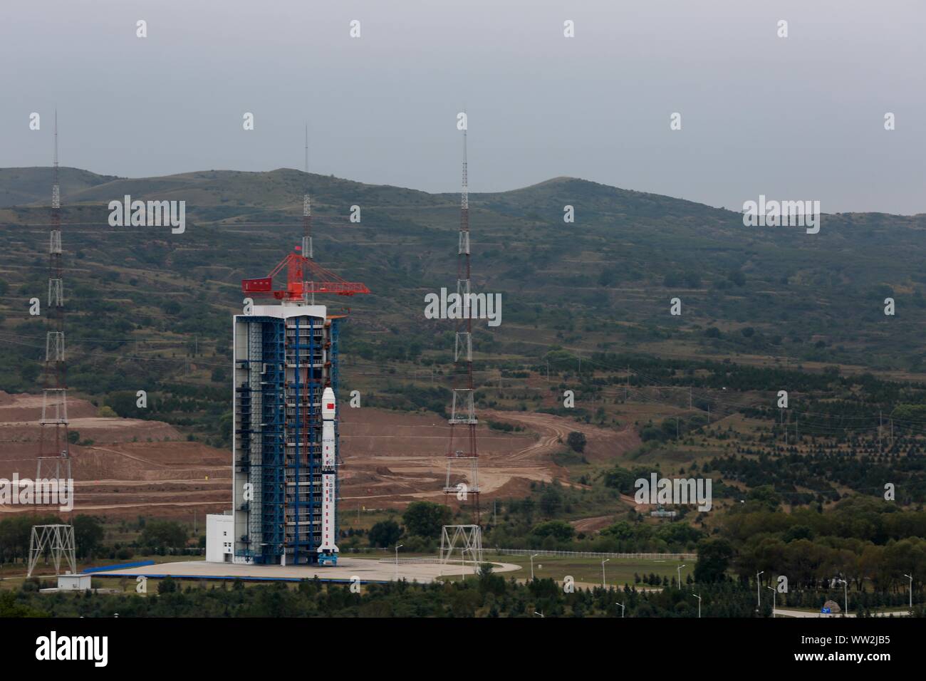 Una lunga marcia 4B (CZ-4B) razzo vettore caricato il polar satellite di osservazione BNU-1 l'ottica mediante telerilevamento satellitare 02D e una micro experimental Foto Stock