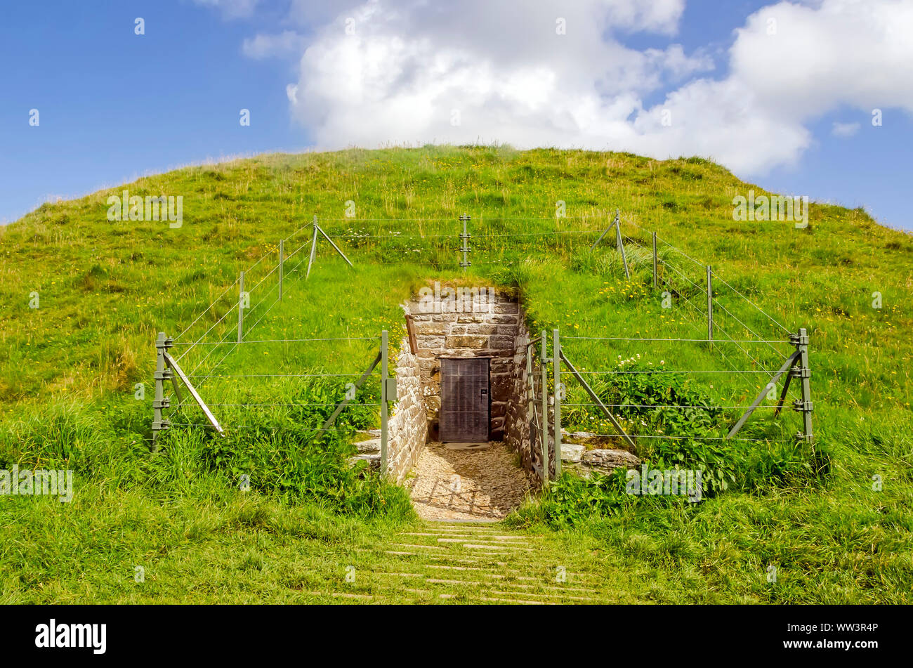 Maeshowe chambered cairn e tomba di passaggio costruito 2800BC parte della parte di Cuore delle Orcadi Neolitiche Sito Patrimonio Mondiale dell'UNESCO, Stenness, isole Orcadi, Foto Stock