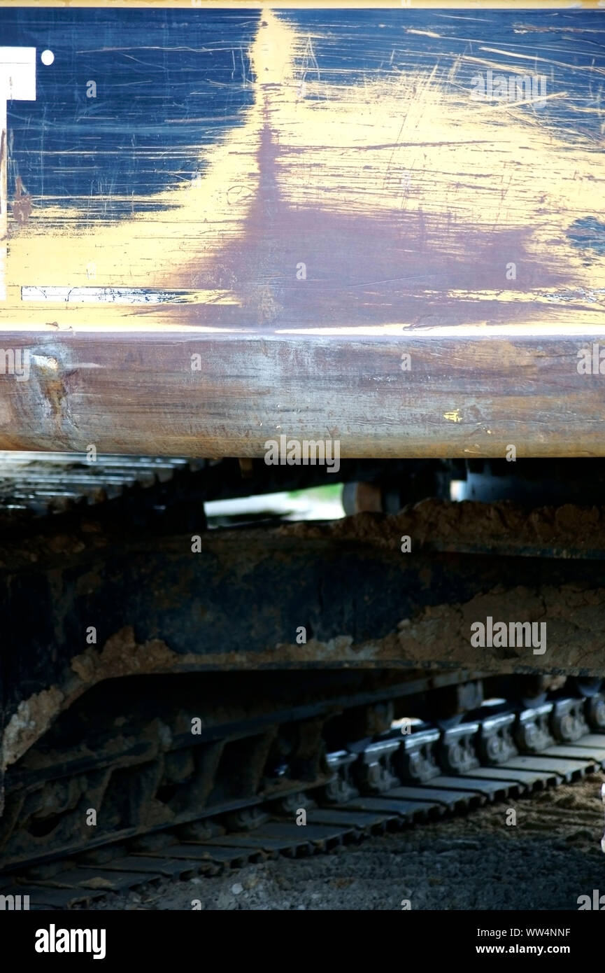 La fotografia di un escavatore e attrezzature per la costruzione di un fossato, Foto Stock