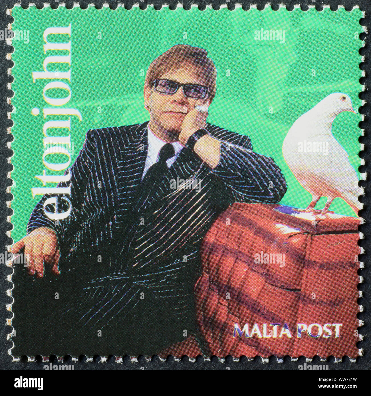 Elton John ritratto sul timbro di Malta Foto Stock