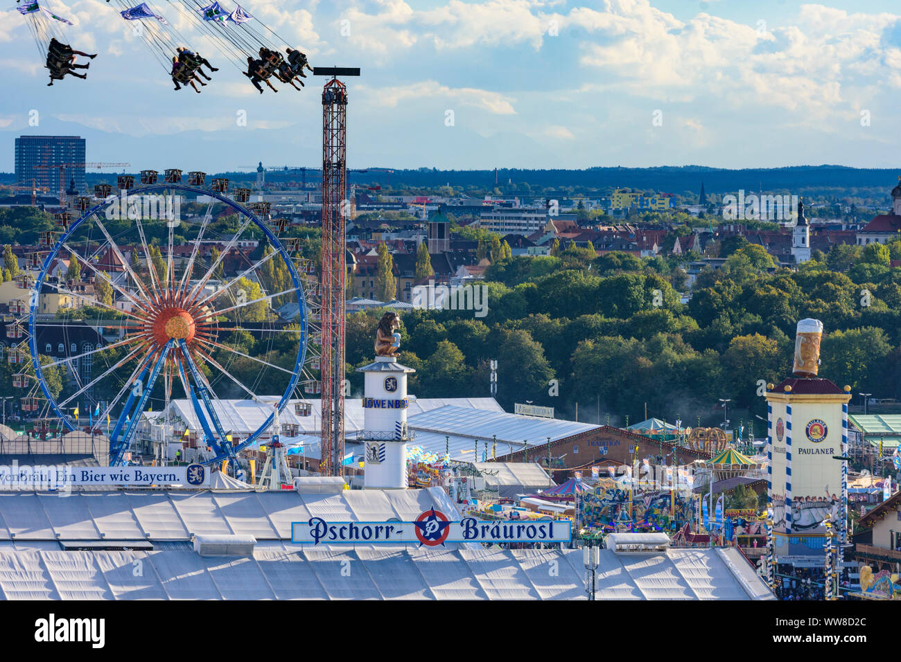 MÃ¼Nchen, Monaco, festival della birra Oktoberfest, visualizzare la birra tenda, corse, roller coaster, ruota panoramica Ferris, giostra Starflyer, Alta Baviera, Baviera, Germania Foto Stock