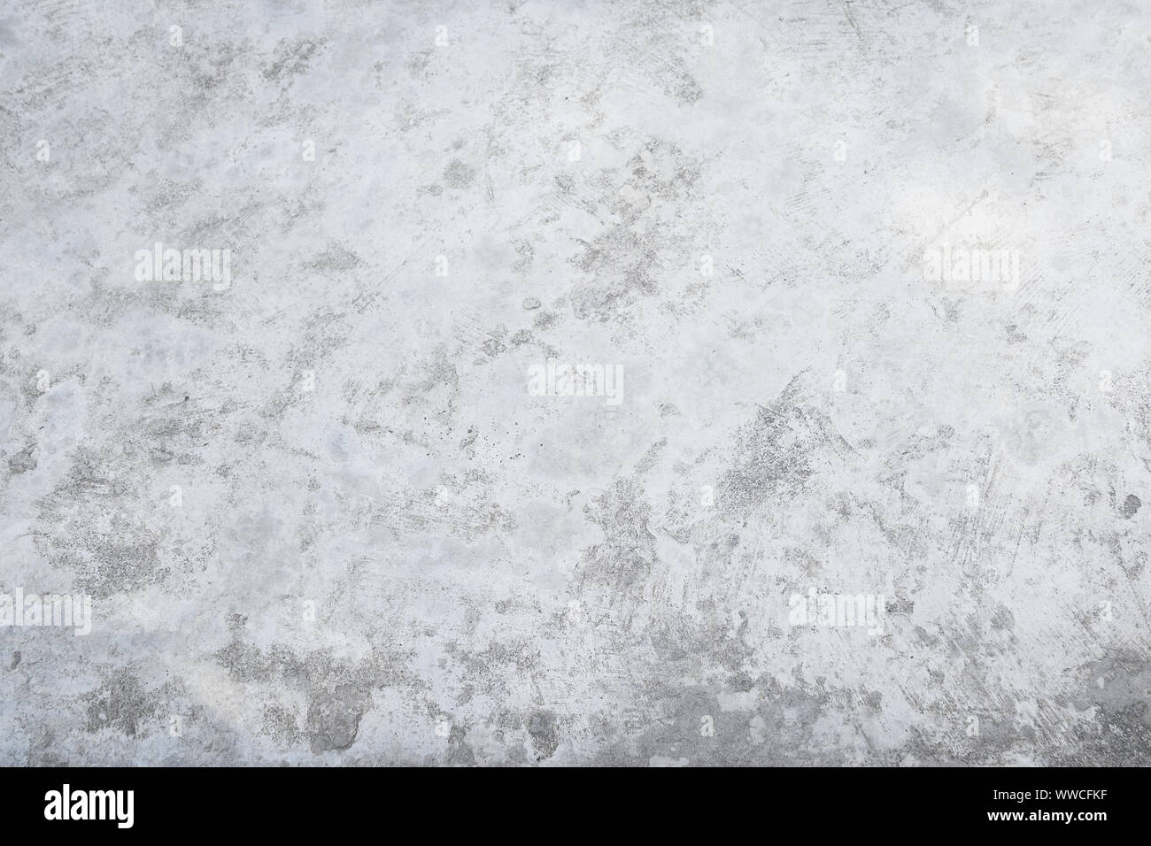 Il vecchio grunge ruvida grigio bianco pavimento di cemento sfondo texture Foto Stock
