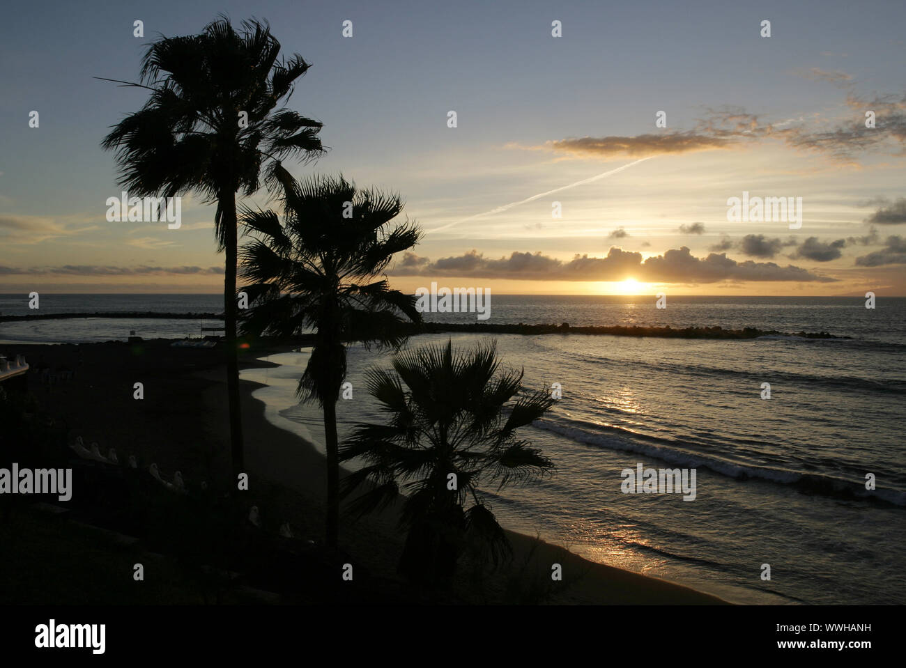 Canarie, Tenerife, tramonto a Playa de las Americas Foto Stock