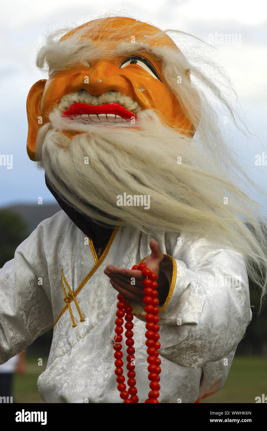 Il vecchio bianco buddista Maschera di danza, Mongolia Foto Stock