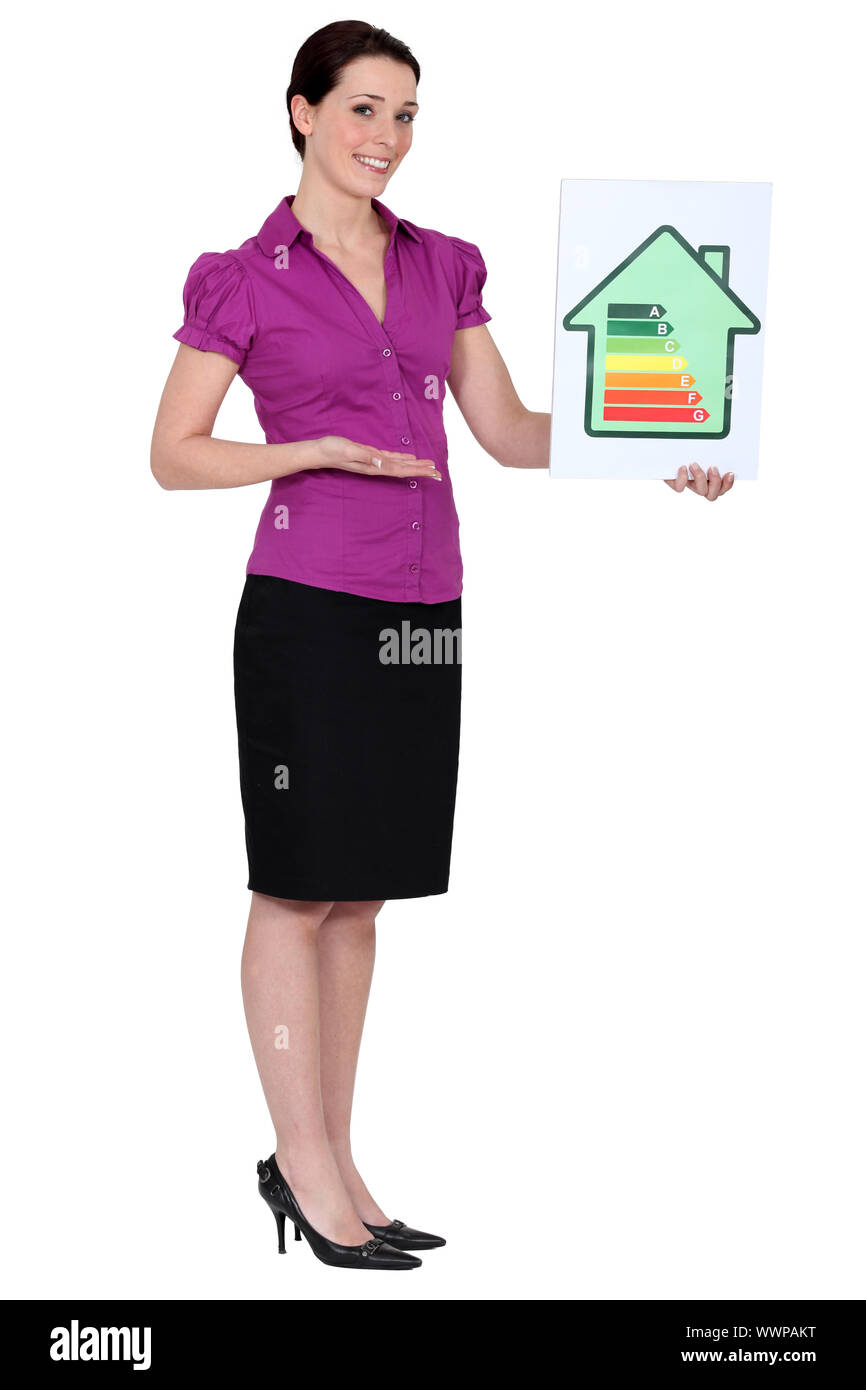 Donna che mantiene l'energia della scheda Classificazione Foto Stock